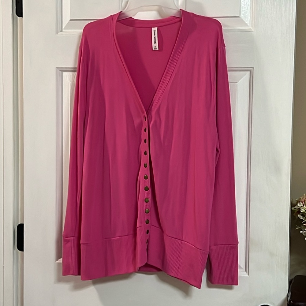 Set of 3 cardigans from a local boutique. All size 2x. Snap button from.